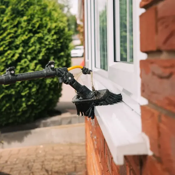 Pure water brush rinsing a freshly cleaned window sill